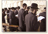 The Kollel prays at the Kotel, and reads the names of the donors at the holy site